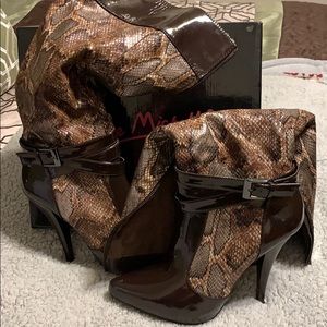 Knee high snakeskin boots
